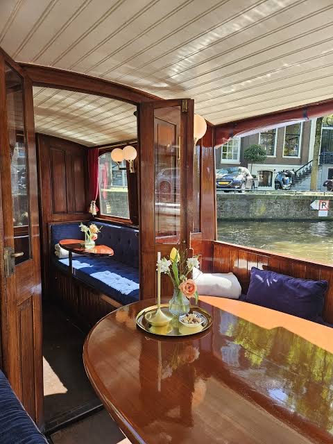 Enclosed canal boat